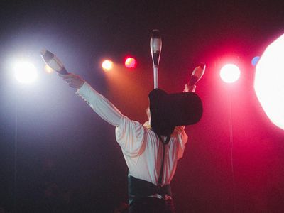 Close-up on hands showing concentration and balance.